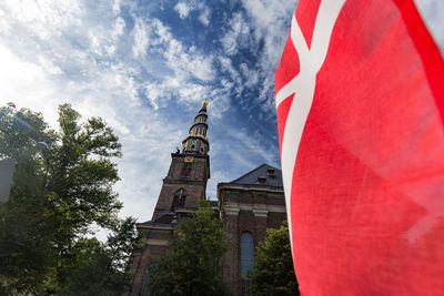 Low angle view of flag against sky