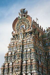 Low angle view of statue against building