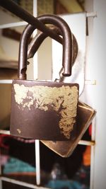 Close-up of padlocks on metal