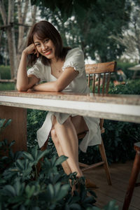 Portrait of young woman looking away