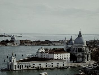View of buildings by sea