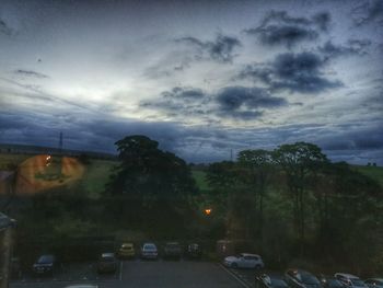 Traffic on road at dusk