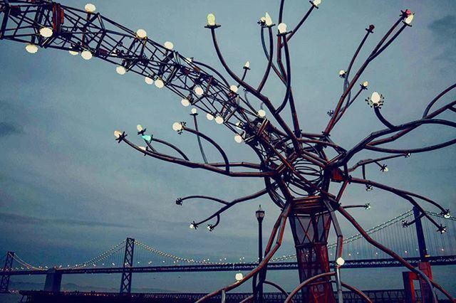 built structure, connection, sky, architecture, low angle view, metal, engineering, bridge - man made structure, cloud - sky, suspension bridge, metallic, silhouette, cloud, travel destinations, international landmark, outdoors, dusk, no people, cloudy, bridge