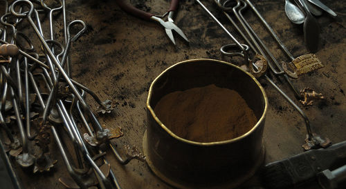 High angle view of work tools in workshop