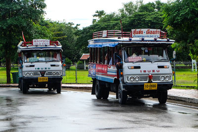 Cars on road against sky