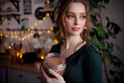 Girl with a can of buckwheat