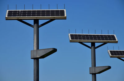 Low angle view of road solar panel against clear sky
