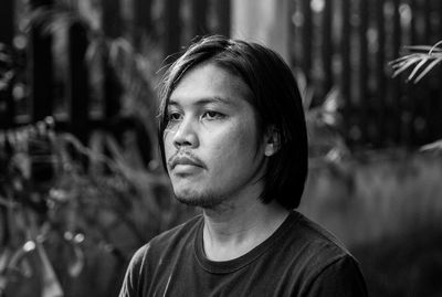 Portrait of young man looking away