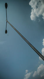Low angle view of street light against sky