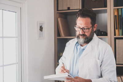 Young man working at home