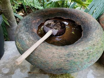 High angle view of water flowing in container