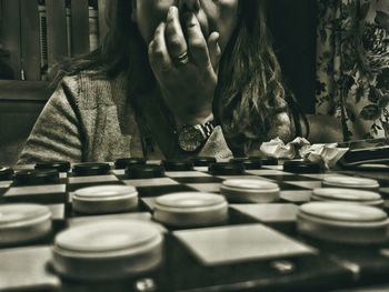 Close-up of woman on table