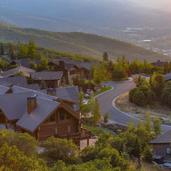 High angle view of road by buildings and mountain