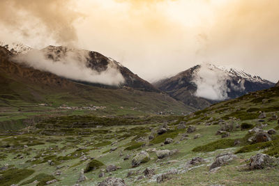 Scenic view of snowcapped mountains against sky