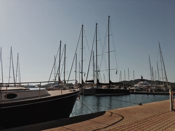 Boats moored at harbor