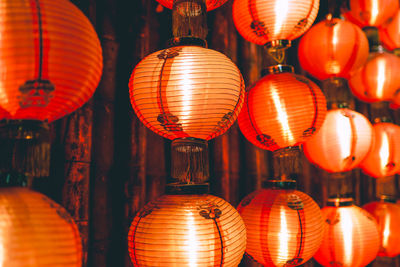 Full frame shot of illuminated lanterns hanging for sale at market