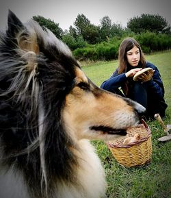 Side view of woman with dog