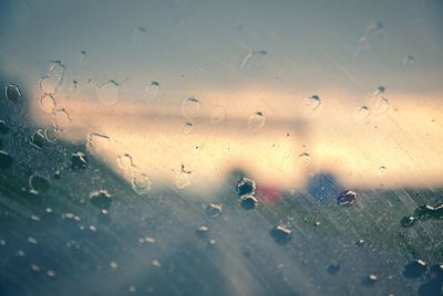 Full frame shot of raindrops on window