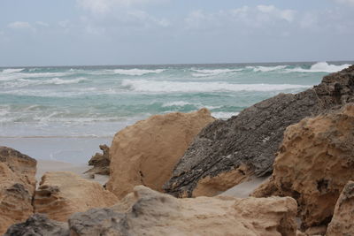 Scenic view of beach against sky