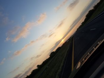 Panoramic view of road against sky during sunset