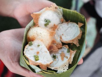 Close-up of hand holding food