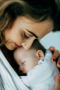 Close-up of mother with baby