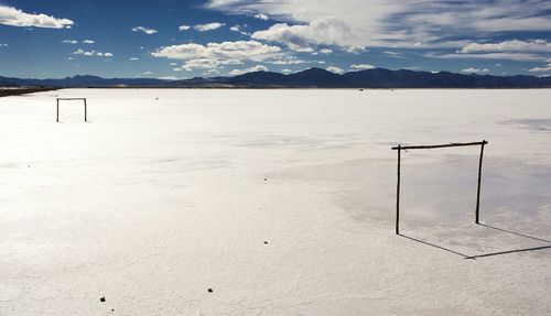 Goal post on snow covered ground