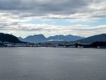 Scenic view of mountain against cloudy sky