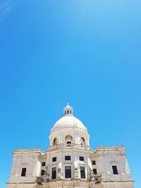 Low angle view of church of santa engracia against clear blue sky