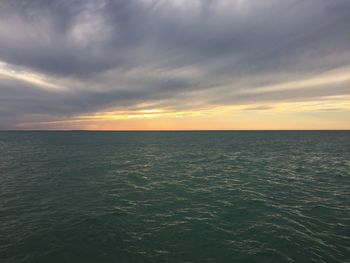 Scenic view of sea at sunset