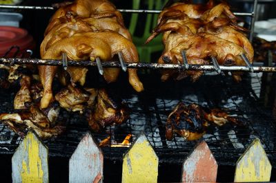 Close-up of meat on barbecue grill