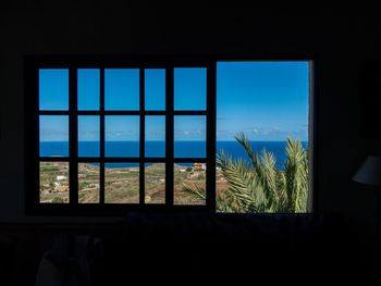 View of sea through window