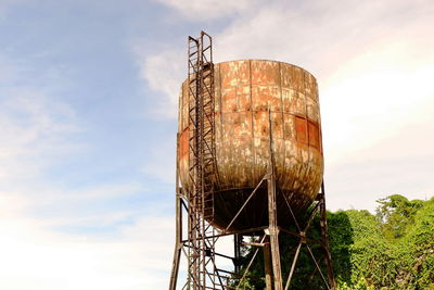 Low angle view of water tower against sky