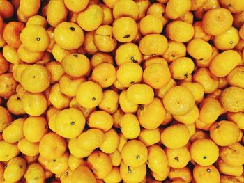 Full frame shot of oranges for sale in market