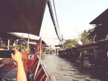 Cropped image of woman looking at river