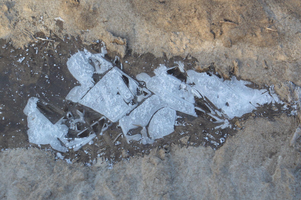 high angle view, no people, day, winter, nature, land, ice, outdoors, soil, damaged, snow, rock, abandoned, geology, sand, wall, freezing