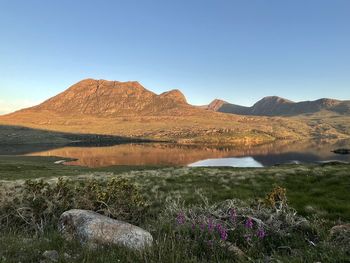 Scenic view of mountains against clear sky