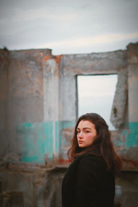 Portrait of a young woman looking away