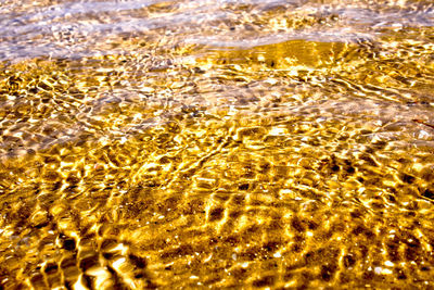 Full frame shot of water flowing in sea