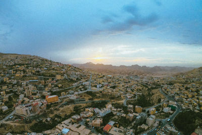 High angle shot of townscape against sky