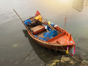 High angle view of boat moored in water