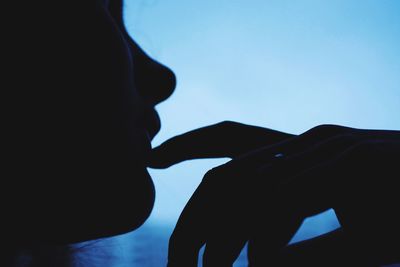 Man with dog in background