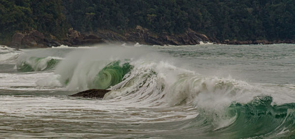 Sea waves splashing on shore