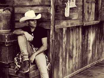 Portrait of cowboy sitting 