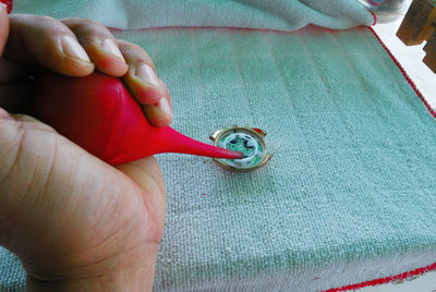 Close-up of person holding hands