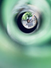 High angle view of hole in plate