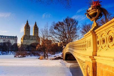 Historic building against sky during winter