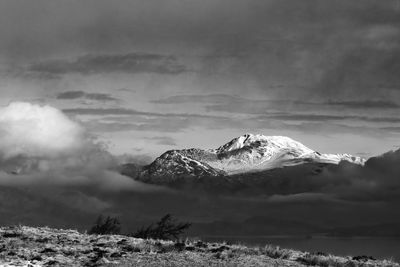 Scenic view of mountains against sky during winter