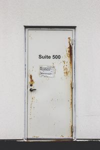 Close-up of text on wall