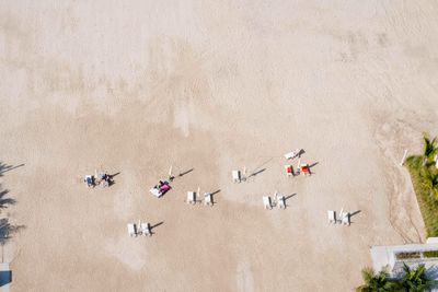 View from above people laying on the beach